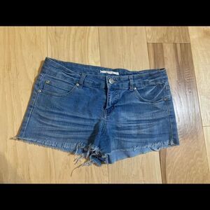 Forever 21 size 30 mid rise cutoff blue jean shorts.